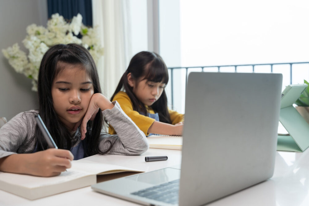 selective focus of curly african american kid sitting on rocking horse and looking at camera near | Divorce Mediation Facilitates Positive Child Outcomes in UK